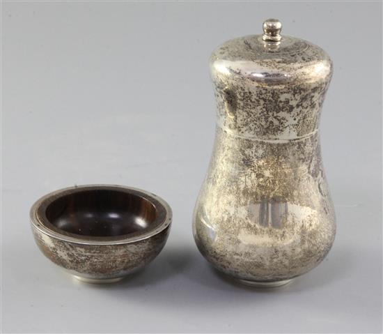 A late 1970s silver baluster pepper mill and a silver mounted hardwood salt, by Simon J. Beer (Lewes), pepper mill 12.8cm.
